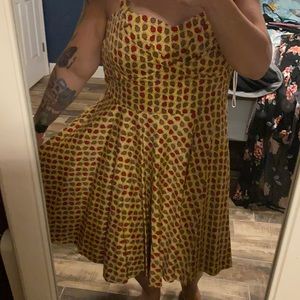 Retro cut Apple dress